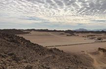 Sunset Desert Safari Trip by Quad Bike with Camel Ride and Bedouin Dinner 