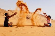 Morning Red Dunes with Camel Ride, Sandboarding and Refreshments 