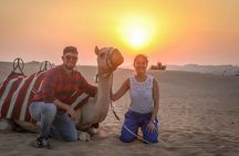 Private Red Dune Safari with BBQ, Camel Ride & Traditional Shows