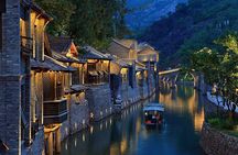 Beijing Evening Tour: illuminated Great Wall and Gubei Water Town