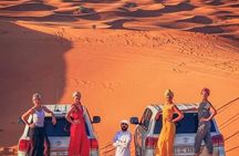 Private Desert Excursion with camel ride Sandboard & BBQ Dinner