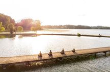 Relax and nature: Yoga lesson on the shore of the lake with picnic