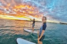 Sunset paddleboard group session Caribbean Sea. Foto's included!