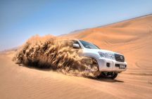 Private Desert Excursion with camel ride Sandboard & BBQ Dinner