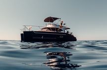 Private Caldera Cruise with Power Catamaran ENJOY incl. Meal & Drinks