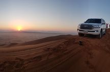 Morning Red Dune Desert Safari in Dubai with Camel Ride and Sand Boarding