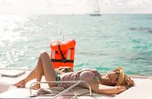 Isla Mujeres Catamaran Tour with Snorkel, Open bar and Transport 
