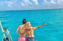 Isla Mujeres Catamaran Tour with Snorkel, Open bar and Transport 