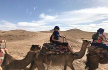 Sunset Camel Ride experience at the Agafay rocky Desert.