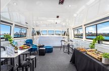Vivid 90-Minute Sydney Harbour Intimate Catamaran Cruise with Canapes