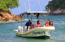 Amazing tour boat through wild nature in Huatulco Bays
