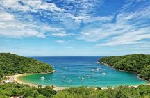 Amazing tour boat through wild nature in Huatulco Bays