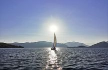 Private Tour on a Sailing Boat on Lake Maggiore with Aperitif and Music