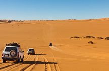 Morning Desert Safari plus Quad Bike, Sandboard and Camel ride
