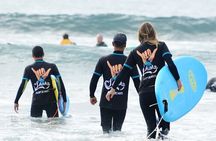 Group Surf Class in Playa de Las Américas with Photographs