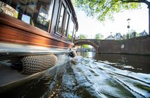 Private Boat Tour Amsterdam - 90 Min incl. welcome drink on historic saloon boat