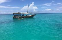 Private Full-day Dhow Cruise to Mnemba Island reef for Snorkeling