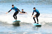 Group Surf Class in Playa de Las Américas with Photographs