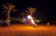 One hour Quad Bike at Red Sand Desert Safari with Camel Ride and BBQ Dinner