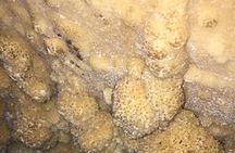 Caving tour ( stalactites-stalagmites) & hiking at national park 