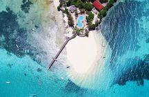 Prison Island; Stone Town Tour; Secret Garden; Kuza Cave; Paje Beach; The Rock