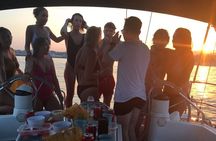 Sunset boat trip with open bar of cava (local champagne)