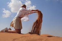 Evening Desert Safari in Dubai with Dune Bashing , Camel Ride and BBQ Dinner