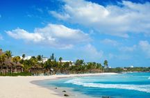 Experience swimming with turtles and explore the ruins of Tulum. Lunch included.