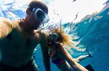 Arch Boat Tour and Snorkeling at Pelican Rock