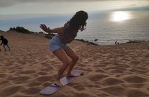Sandboarding and sunset in Concón