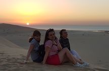 Doha: Sunrise /Sunset Desert Safari with Sand Boarding,Camel ride