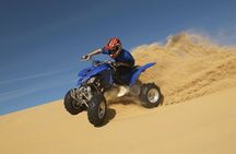 Desert Quad Biking Tour and Sand Boarding with Dinner in Dubai
