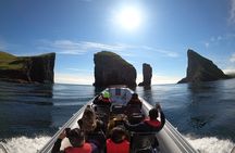 Boat tour to Drangarnir Sea Stacks