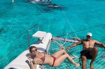 Catamaran Sailing through gorgeous waters of the Caribbean Sea to Isla Mujeres 