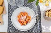 Dining experience at a local's home in Pontedera with cooking demo
