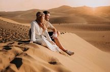 Private Morning Desert Safari with Camel Ride & Sandboarding