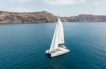 Santorini Luxury Sailing Catamaran Cruise with BBQ, Drinks and Transfer