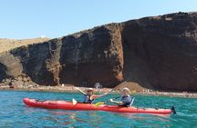 Santorini Sea Kayak – Volcanic Cliffs, Hidden Sea Caves & Picnic
