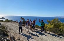Small group hiking between the beach and Kritinia Castle