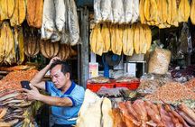 Tuol Sleng Museum and Russian Market Half-day Tour
