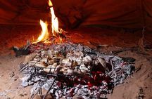 2 Day Wadi Rum Tour: Traditional Dinner and Starlit Cave Camp