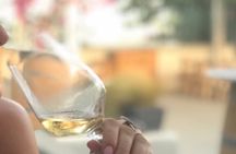 Santorini wine tasting and Traditional Cave Settlement Tour