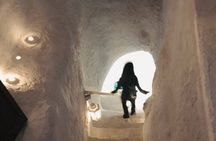 Santorini wine tasting and Traditional Cave Settlement Tour