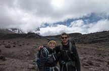 Climb Mt. Meru and 4 hours Game drive Safari.