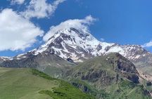 Day tour to mountains Jinvali lake, Ananuri, Kazbegi, Arch friendship 