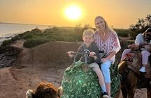 Sunset camel with barbecue dinner