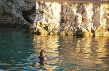 Take a half-day trip to the wild bays with captain Adorio & Dino 
