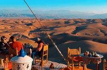 Marical dinner and camel ride at sunset in Desert of Marrakech