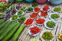 Thai Cooking Class and Visit to the Local Market with your English-speaking guide