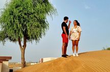 The Ghost Village Safari Tour with Dune Bashing and Sandboarding